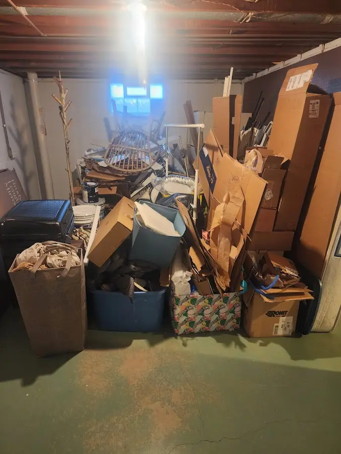 Roll-off dumpster container at job site for 2 Yard Dumpster Rental in East Rochester